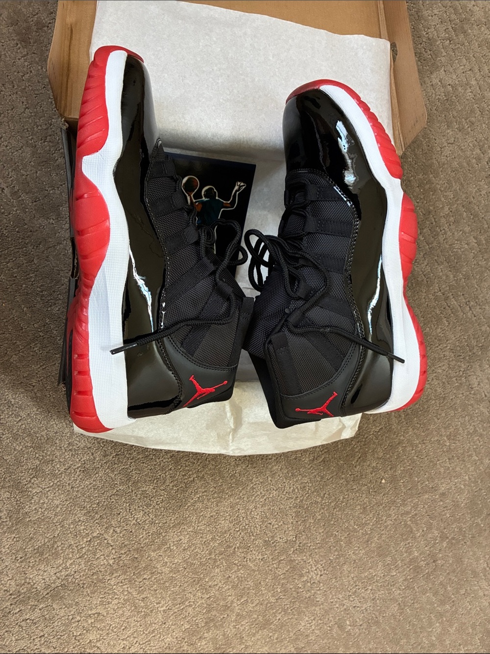 AIR Jordan 11 RETRO Black Patent Leather Sneakers with Red Accents